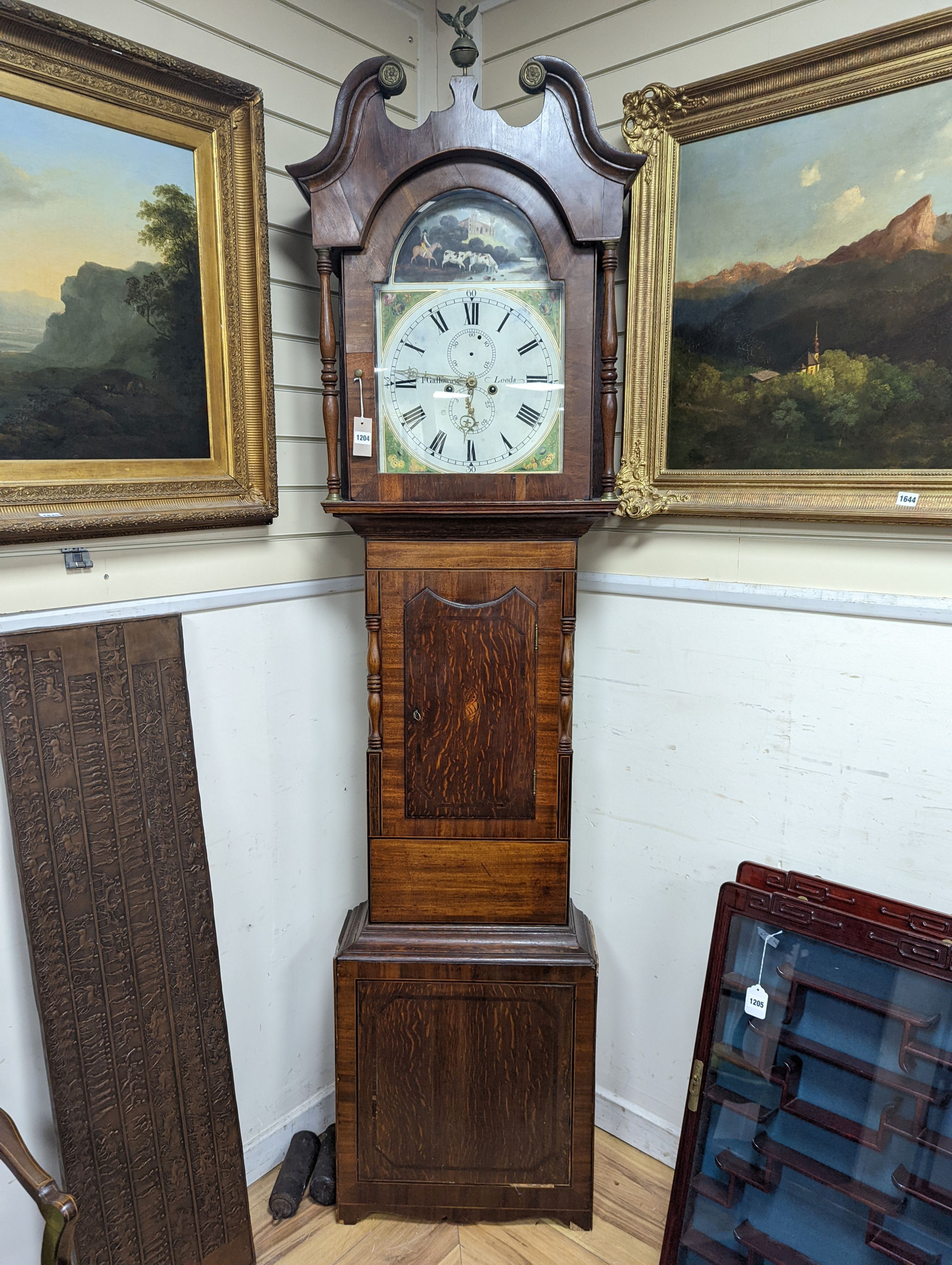 Galloway of Leeds. An early 19th century mahogany and oak 8 day longcase clock, with painted dial, height 233cm